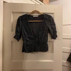 Navy blue shirt sleeve blouse with white detailing